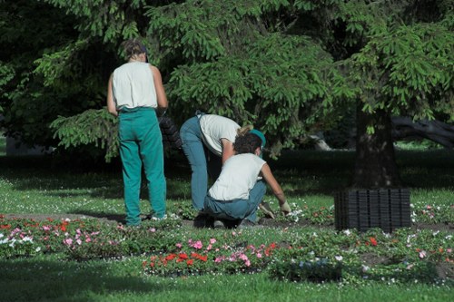 Gardener reviewing safety and access details before starting work